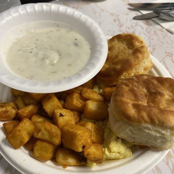 Wagner's Pharmacy - Trackside Platter - 2 biscuits, scrambled eggs, potatoes, plus a side of sausage gravy - Breakfast & Brunch Near Me - Louisville, Kentucky Wagner's Pharmacy - Trackside Platter - 2 biscuits, scrambled eggs, potatoes, plus a side of sausage gravy - Breakfast & Brunch Near Me - Louisville, Kentucky