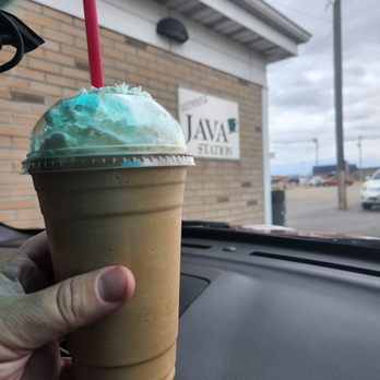 Deanna's Java Station - a hand holding a cup of iced coffee - Coffee & Tea Near Me - Clinton, Iowa Deanna's Java Station - a hand holding a cup of iced coffee - Coffee & Tea Near Me - Clinton, Iowa