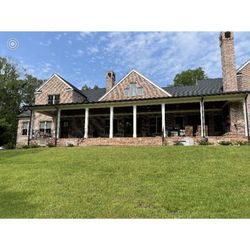 Gutter Guys Construction - GAF Timberline HDZ shingles, 24 gauge standing seam metal, and 6" seamless gutters in Lexington