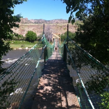 Sweetwater River Ranch - My German Shepherd crossing the wire foot bridge. - RV Parks Near Me - Cotopaxi, Colorado Sweetwater River Ranch - My German Shepherd crossing the wire foot bridge. - RV Parks Near Me - Cotopaxi, Colorado