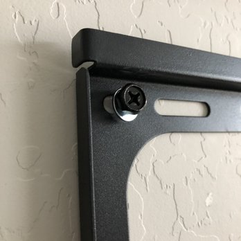 We Mount TVs - Brackets had some screws into drywall instead of studs only.  Waste of a hole in the wall. - Home Theatre Installation Near Me - Las Vegas, Nevada