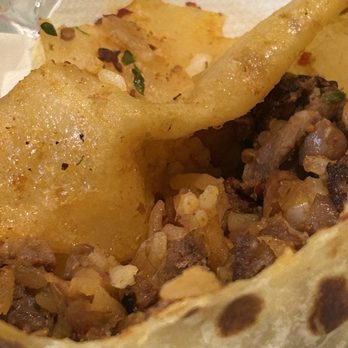 Los Portales Taqueria - Al pastor burrito with a curly hair on it by the meat - Mexican Near Me - Concord, California