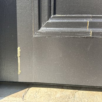 HMC Contracting - The door is already looking aged, though it's less than a year old - Decks & Railing Near Me