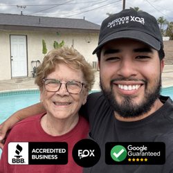 Fox Roofing Company - Another happy homeowner, nothing beats a smiling client after a successful roof replacement by Fox Roofing Company.