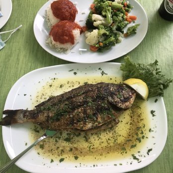 Delphi - Dorade gegrillte with tomato rice and vegetables - Greek Near Me - Kaiserslautern, RP Delphi - Dorade gegrillte with tomato rice and vegetables - Greek Near Me - Kaiserslautern, RP