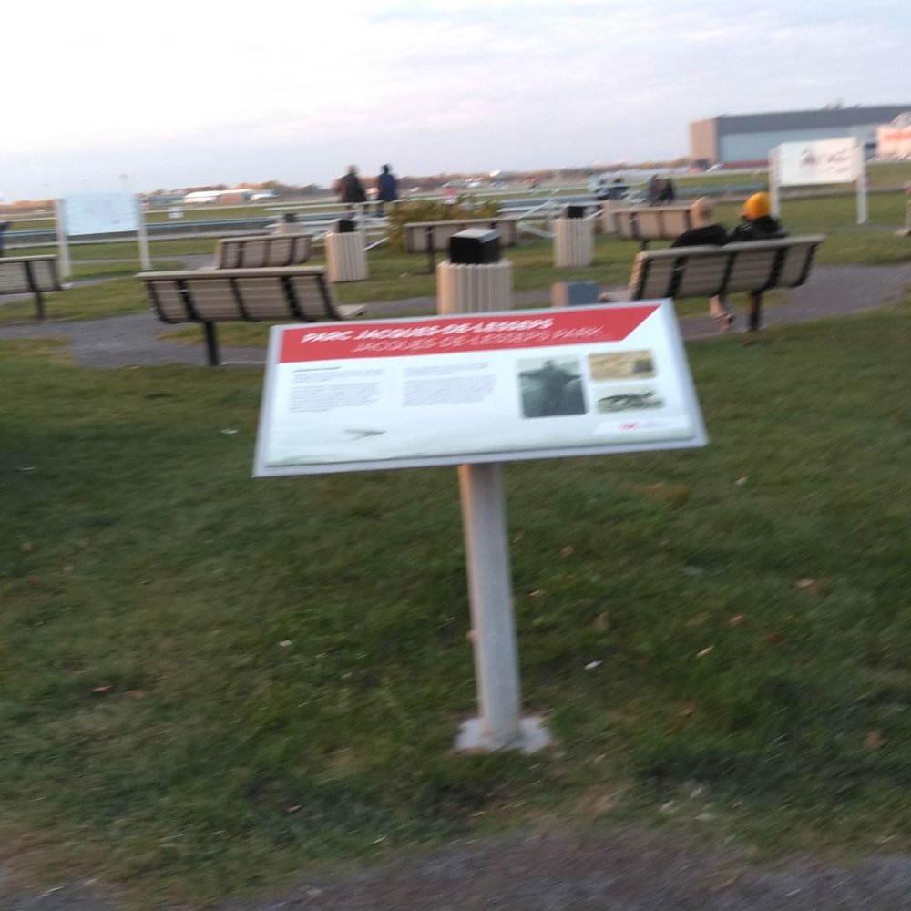 Jacques de Lesseps Park - Here, you can see benches and tables, with the airport property beyond. - Parks Near Me - Montreal, Quebec