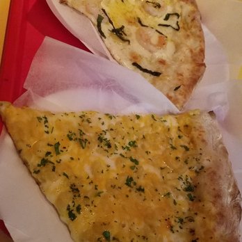 Nick's Pizzarelli - Mac & Cheese pizza (front) and Shrimp Scampi pizza (back) - Pizza Near Me - Wilton Manors, Florida Nick's Pizzarelli - Mac & Cheese pizza (front) and Shrimp Scampi pizza (back) - Pizza Near Me - Wilton Manors, Florida