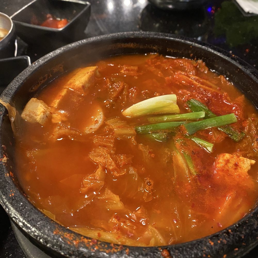 Kimchee jigae (stew), so good. Had rice cakes and broth good. Large portion