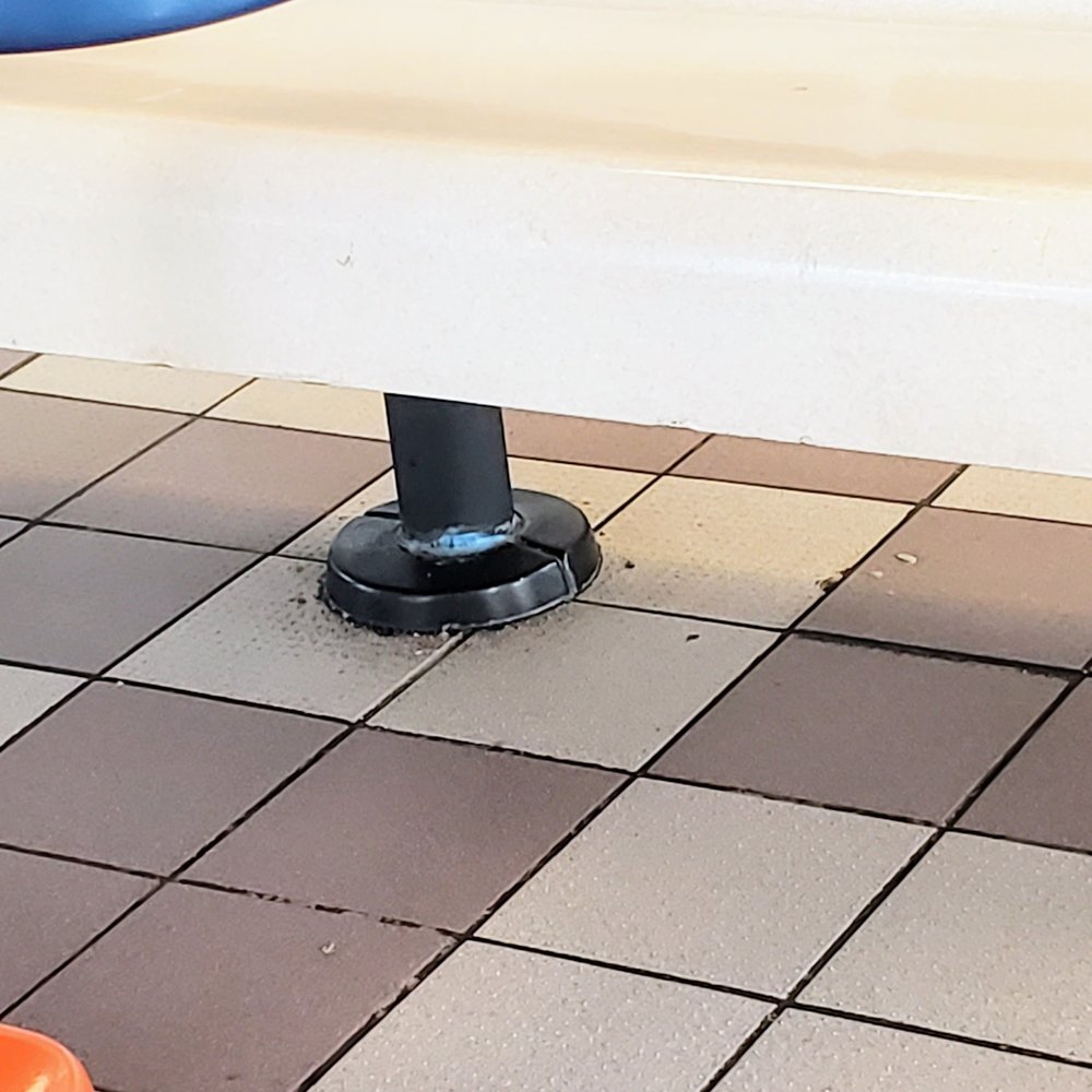 White Castle - an orange bench and a black chair - Burgers Near Me - South Amboy, New Jersey White Castle - an orange bench and a black chair - Burgers Near Me - South Amboy, New Jersey