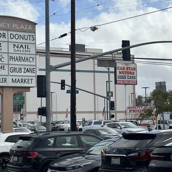 Donuts & More - a parking lot full of cars - Donuts Near Me - North Hollywood, California Donuts & More - a parking lot full of cars - Donuts Near Me - North Hollywood, California