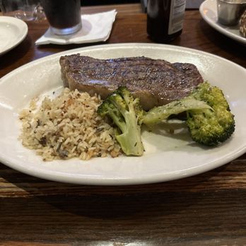 Black Angus Steakhouse - My steak with rice pilaf and broccoli - Steakhouses Near Me - Buena Park, California Black Angus Steakhouse - My steak with rice pilaf and broccoli - Steakhouses Near Me - Buena Park, California