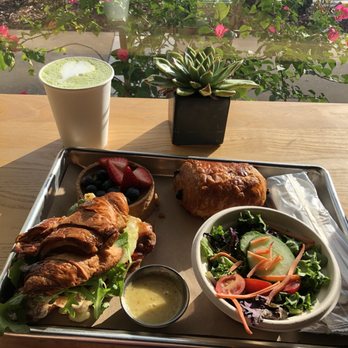 Flower Cafe - Bacon and egg croissant with a side salad, chocolate croissant and fruit tart - Coffee & Tea Near Me - Kissimmee, Florida
