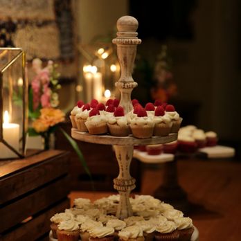 Lila & Sage Cake & Catering Co. - a display of cupcakes - Caterers Near Me - Murphys, California