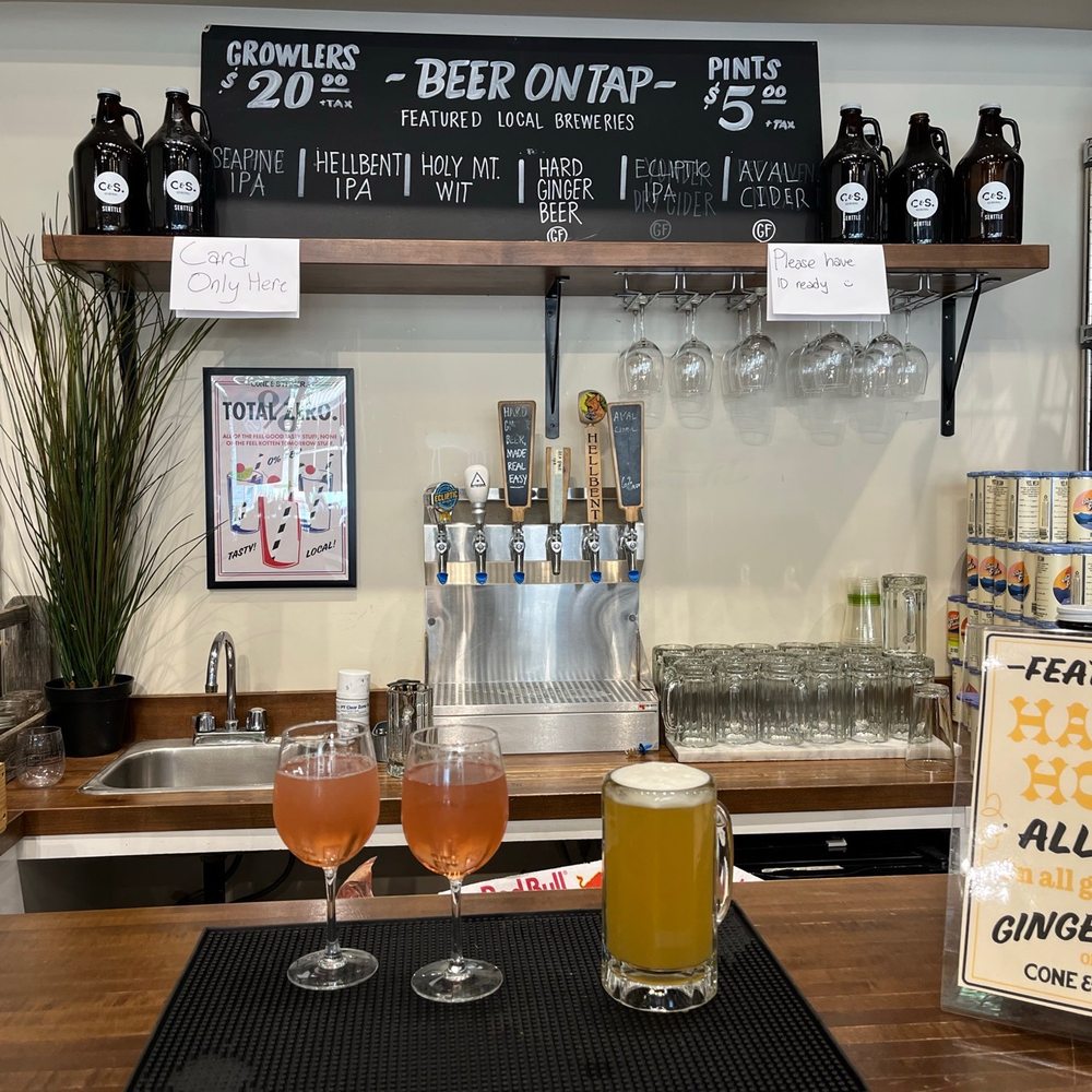 two glasses of beer on a bar two glasses of beer on a bar