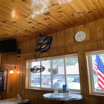 Tally Ho BBQ - a man standing in front of a window - Barbeque Near Me - Curtis, Michigan Tally Ho BBQ - a man standing in front of a window - Barbeque Near Me - Curtis, Michigan