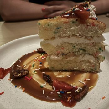 360 Westport - House-made Funfetti cake with caramel and strawberries (special item) - Bars Near Me - St. Louis, Missouri