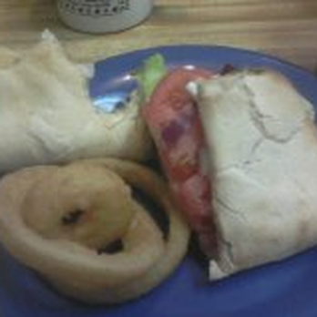 Fuzzy's - folded sandwich with onion rings - Breakfast & Brunch Near Me - Saginaw, Michigan