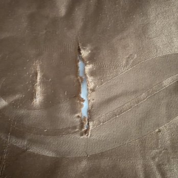Quality Inn By Choice Hotel - Tears in the covers. - Hotels Near Me - Flagstaff, Arizona