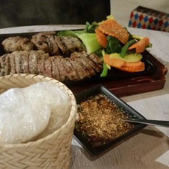 Crying Thaiger - Crying thaiger signature dish - beef brisket with sticky rice - Thai Near Me - Malden, Massachusetts Crying Thaiger - Crying thaiger signature dish - beef brisket with sticky rice - Thai Near Me - Malden, Massachusetts
