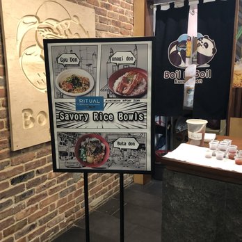 Boil Boil Ramen - a sign in front of a brick wall - Ramen Near Me - New York, New York Boil Boil Ramen - a sign in front of a brick wall - Ramen Near Me - New York, New York