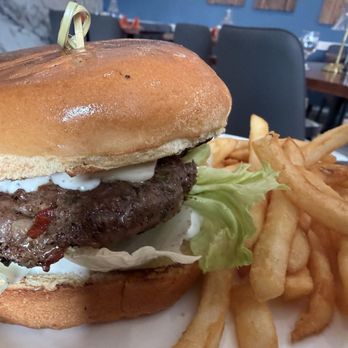 Ruhani Kitchen - "Smash" burger- well seasoned but had I known it would be covered in sauce I would have requested no sauce. - Mediterranean Near Me - Egg Harbor Township, New Jersey