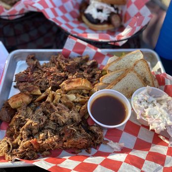 PaveMint Taphouse and Grill - Bbq platter with sandwiches in the back - Bars Near Me - Front Royal, Virginia