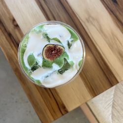 Fig Halo Matcha: house made fig syrup, matcha, & honey cold foam