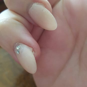 C K Nails And Spa - My broken nail you can tell the nail tip is to small that's why the acrylic is breaking off. - Nail Salons Near Me - Camarillo, California