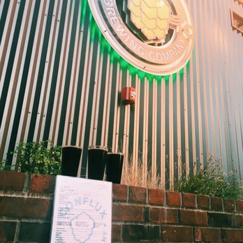 Conflux Brewing - Outside patio decor with beer - Brewpubs Near Me - Missoula, Montana Conflux Brewing - Outside patio decor with beer - Brewpubs Near Me - Missoula, Montana