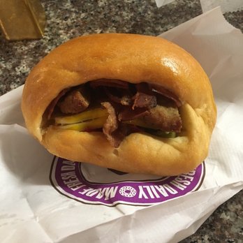 Donuts N Cup - a half eaten sandwich - Donuts Near Me - Rosenberg, Texas