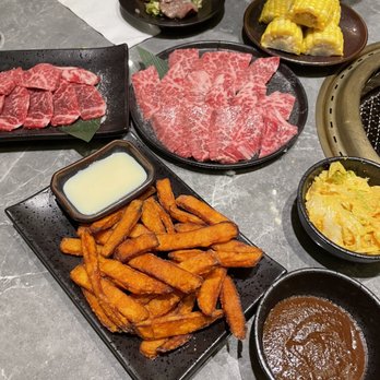 Ishoni Yakiniku - Wagyu and regular short rib at the top. Golden kimchi (to the right) wasn't spicy.. - @eatwithher - Barbeque Near Me - Seattle, Washington