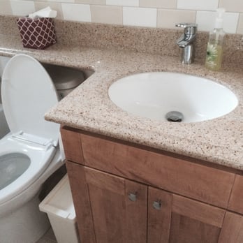 Best Tile - Granite banjo counter top and vanity. Very few places have banjo counter top. Since the bathroom is small, we wanted more counter top space. - Building Supplies Near Me - Santa Clara, California