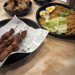 Lamb skewers, chicken cutlet and scallion oil noodles