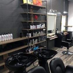 Voodoo Hair Studio - Upstairs! The design of the place is so cool. All the shelving is made from wood and pipes.