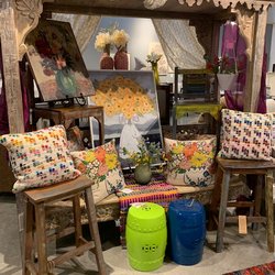 Rug & Home - Gaffney - Cute store display showcasing room accessories and wall decor.