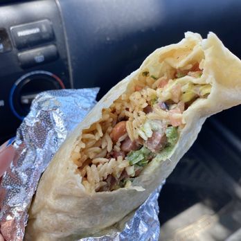 Local Kitchens - Senor Sisig Burrito: does not come with meat, all meat additional charge. I chose tocino (+$1.50). Spicy is not spicy! - Burgers Near Me - Cupertino, California Local Kitchens - Senor Sisig Burrito: does not come with meat, all meat additional charge. I chose tocino (+$1.50). Spicy is not spicy! - Burgers Near Me - Cupertino, California