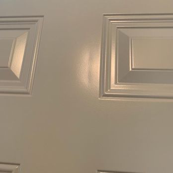 Opal Enterprises - 4" dent in steel door panel. - Windows Installation Near Me - Naperville, Illinois
