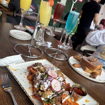 Madres Brunch - Chilaquiles/mimosas Nutella French toast - Breakfast & Brunch Near Me - Bellflower, California Madres Brunch - Chilaquiles/mimosas Nutella French toast - Breakfast & Brunch Near Me - Bellflower, California