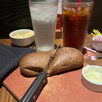 Outback Steakhouse - Bread, beverages and setups - Steakhouses Near Me - Palm Harbor, Florida Outback Steakhouse - Bread, beverages and setups - Steakhouses Near Me - Palm Harbor, Florida
