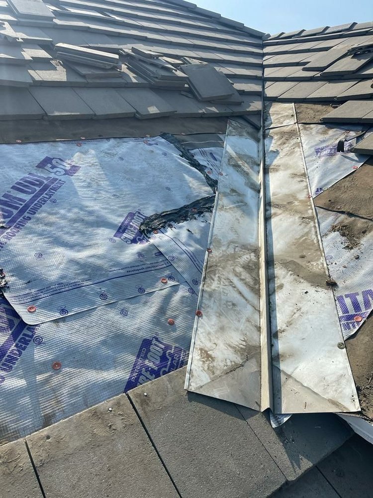 Slide of Economy Roofing & Construction