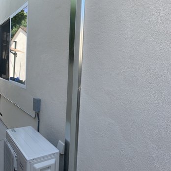 Ed & Ed Brothers - Metal flashing covering all lines - Heating & Air Conditioning/HVAC Near Me