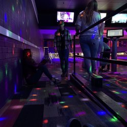 Part of our group sitting on the floor. We has a group of 11 but only 5 people wanted to Bowled.