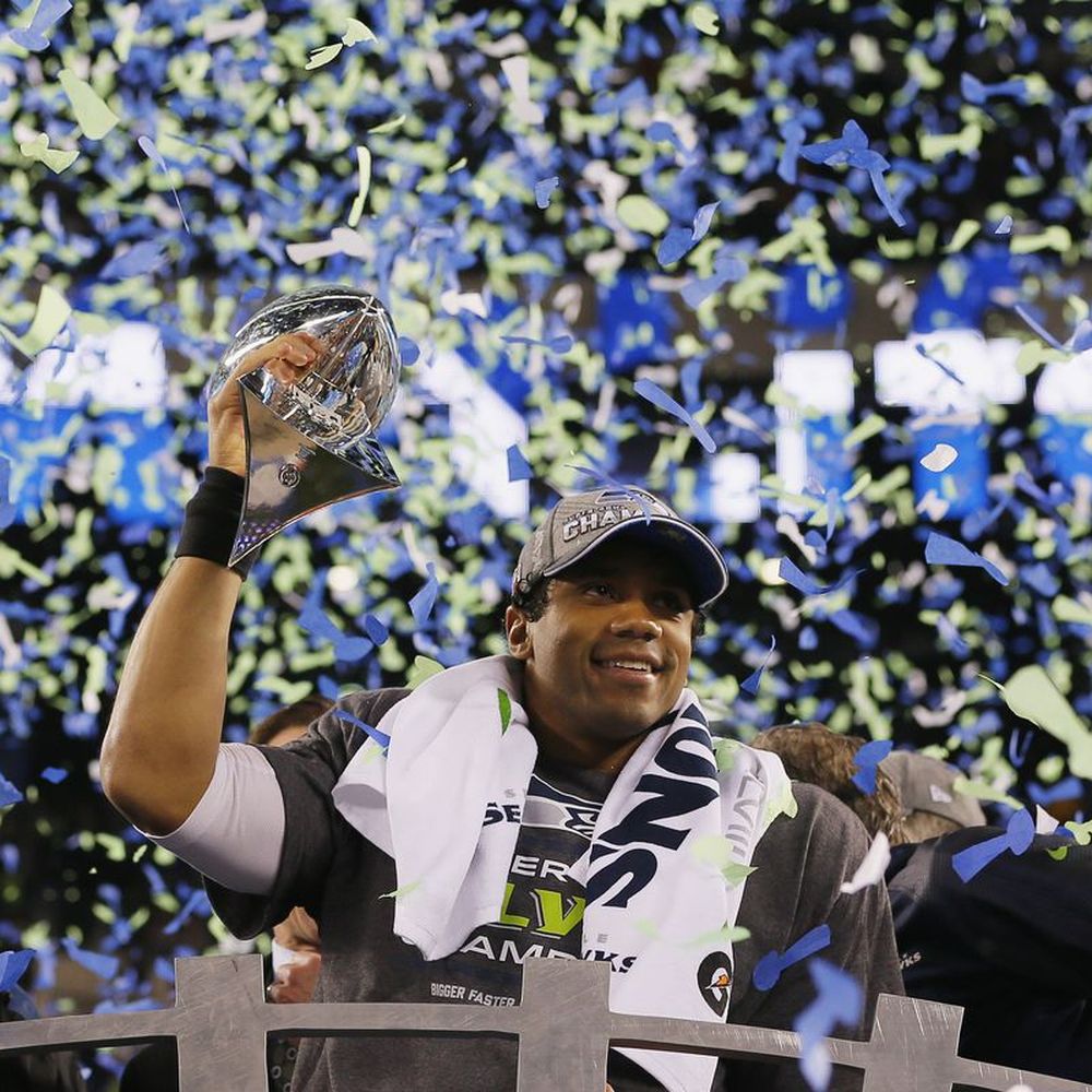 Seattle Seahawks - Russell Wilson after the Seattle Seahawks won Super Bowl XLVIII in 2014 (2013 season) at MetLife Stadium in East Rutherford, New Jersey. - Professional Sports Teams Near Me - Seattle, Washington Seattle Seahawks - Russell Wilson after the Seattle Seahawks won Super Bowl XLVIII in 2014 (2013 season) at MetLife Stadium in East Rutherford, New Jersey. - Professional Sports Teams Near Me - Seattle, Washington
