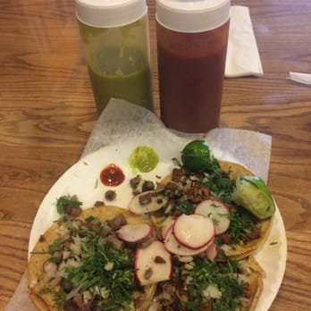 Mexico Restaurant - 2 tacos lenguas and 2 al pastor. Ooops - I ate one already. Love the green sauce! - Mexican Near Me - Passaic, New Jersey