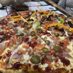 Candy's Café - Pizza mitad mexicana y mitad italiana.