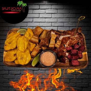 Bartropia Latin Lounge - a platter of food on fire - Latin American Near Me - Spring Hill, Florida Bartropia Latin Lounge - a platter of food on fire - Latin American Near Me - Spring Hill, Florida