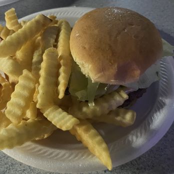 The Hen's Pub - a hamburger and fries on a paper plate - Burgers Near Me - Kingsport, Tennessee The Hen's Pub - a hamburger and fries on a paper plate - Burgers Near Me - Kingsport, Tennessee
