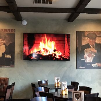 Hennessey's Tavern - Cool art work. Fire place image on the screen. - Pubs Near Me - Dana Point, California Hennessey's Tavern - Cool art work. Fire place image on the screen. - Pubs Near Me - Dana Point, California