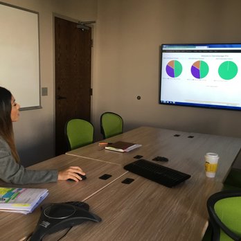 Symed Corporation - One of the SyMed staff members, Bianca doing a demo. - Software Development Near Me Symed Corporation - One of the SyMed staff members, Bianca doing a demo. - Software Development Near Me
