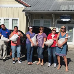 TheKey - Senior Home Care - Sandbag stand up meeting today. Our team picked up 80 sandbags this morning to help distribute to clients in flooded areas.